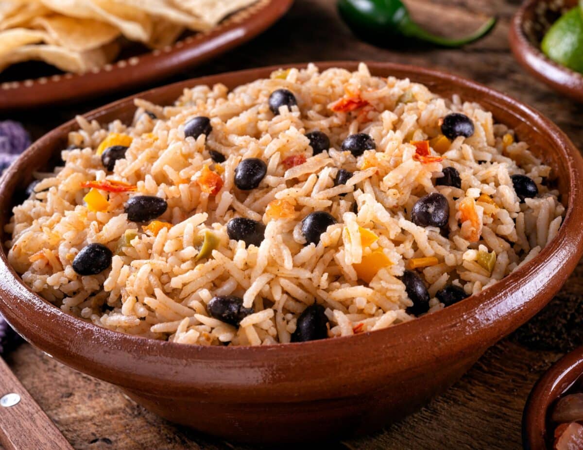 Rice and black beans in a bowl - cheapest food to buy.