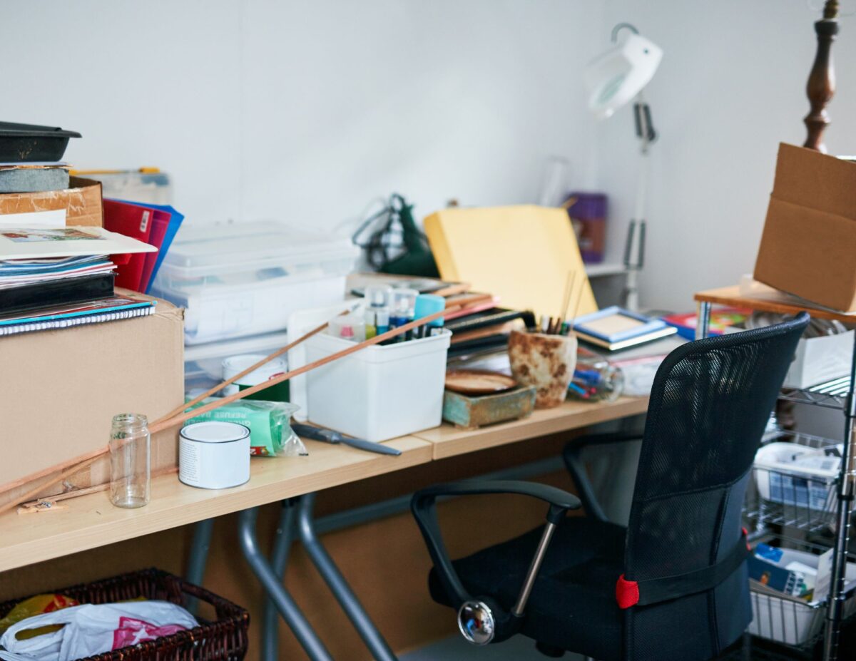 A messy and cluttered office area - how to declutter you home fast.