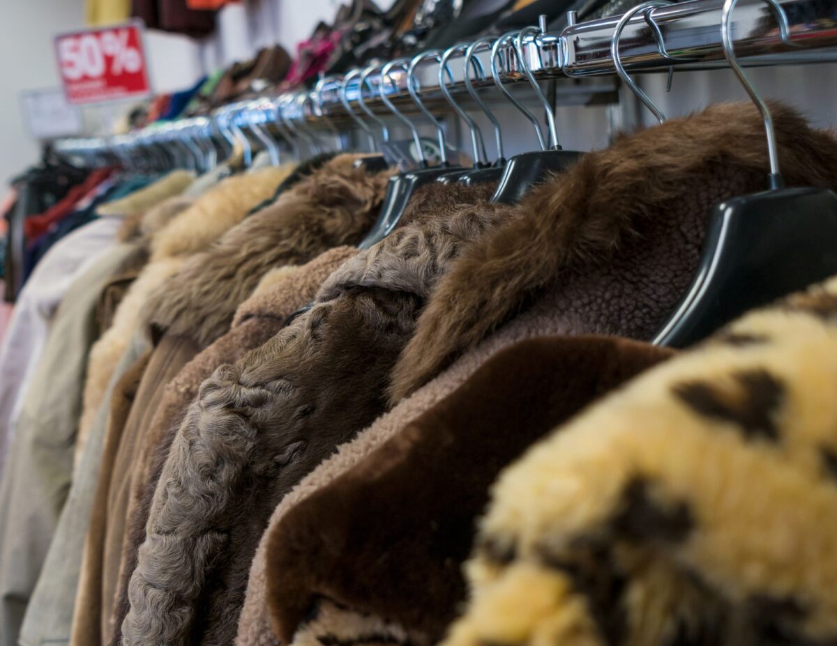 A rack of coats - How to Thrift Shop Like a Pro.