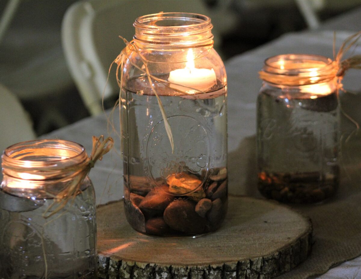 Mason Jars with candles - cheap outside DIY fall decorations.