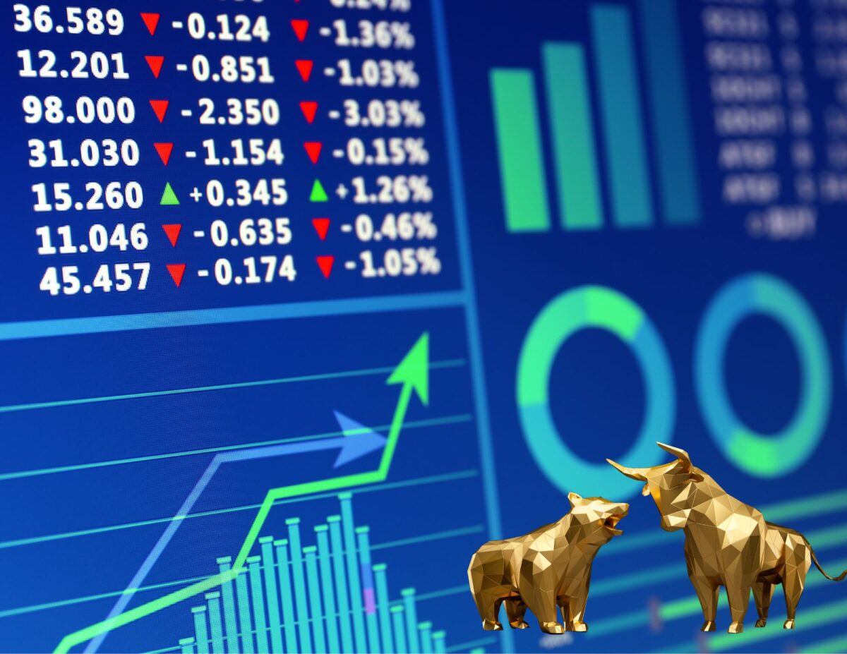 stock market charts with a gold bear and bull - invest on a budget