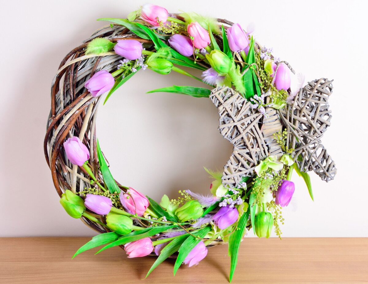 grapevine wreath with lavender and pink tulips and a butterfly - front door decorations for spring