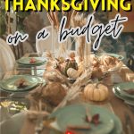 A dining table set with teal plates and autumn decorations promotes ideas for a budget-friendly Thanksgiving meal.