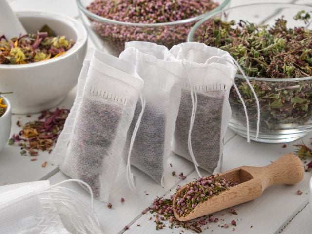 tea bags and scoop full of tea - baby shower favors