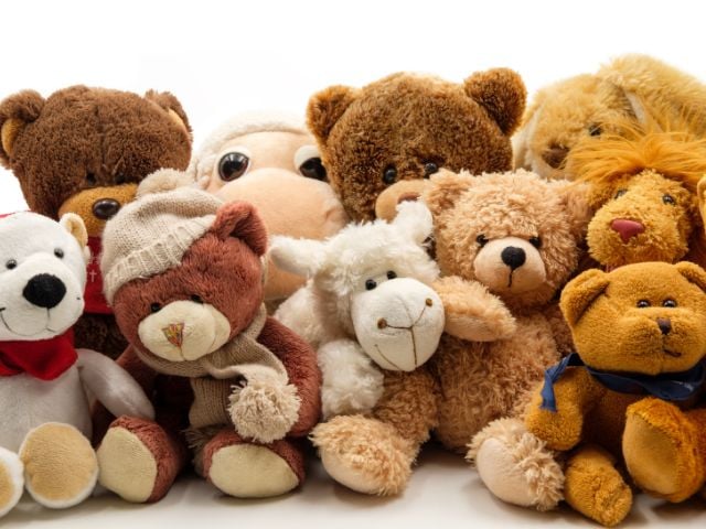 a bunch of stuffed animals - baby shower favors